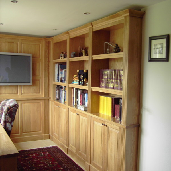 bespoke book shelves and panelling in solid oak for the home office