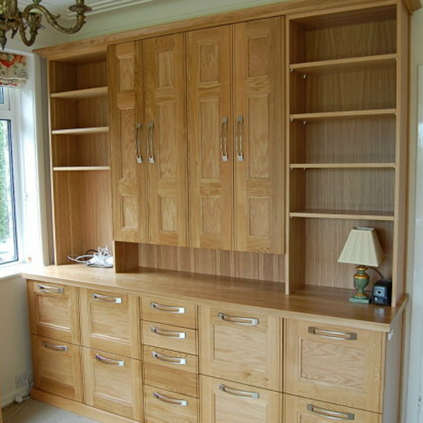 bespoke solid oak home office with flat panelled beaded doors and drawers