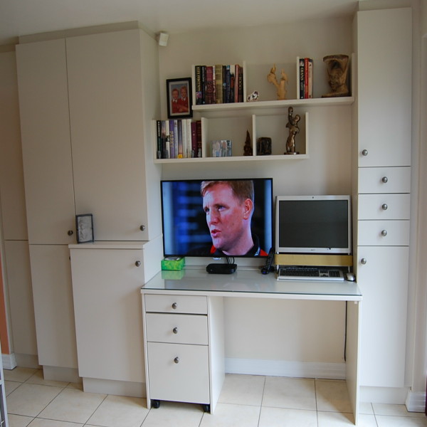 bespoke home/office with a painted finish and glass top to desk area