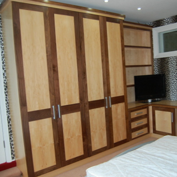 bedroom with solid black walnut surround to doors and drawers with maple veneered centre panels bedroom with solid black walnut surround to doors and drawers with maple veneered centre panels